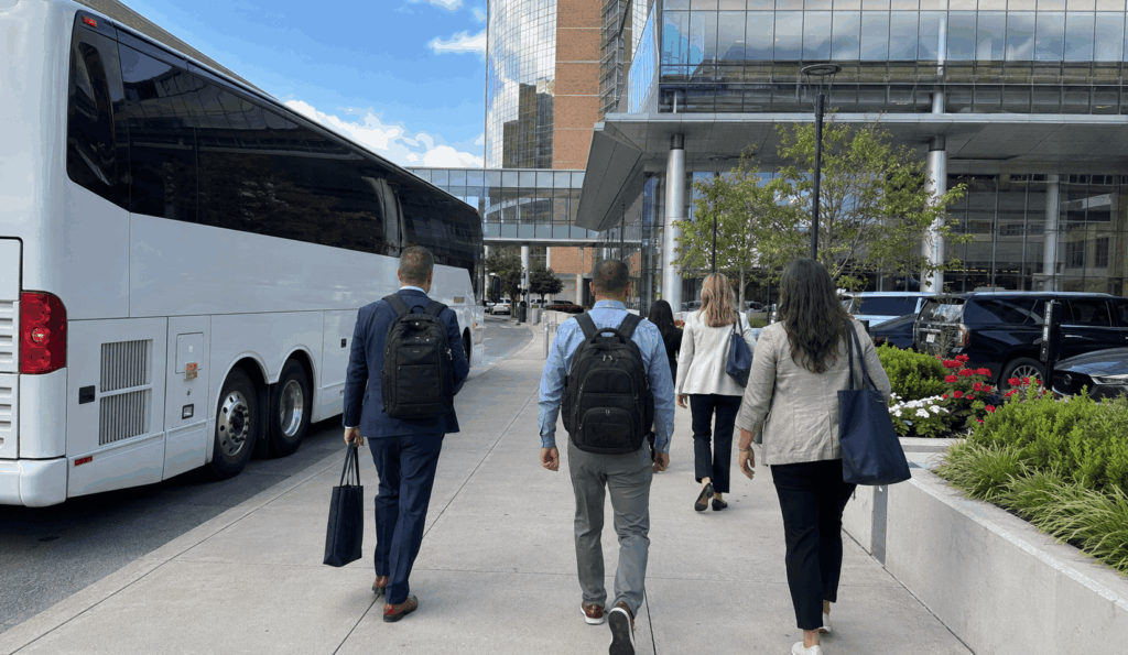 Group arriving by charter bus near the Indianapolis convention and sports district